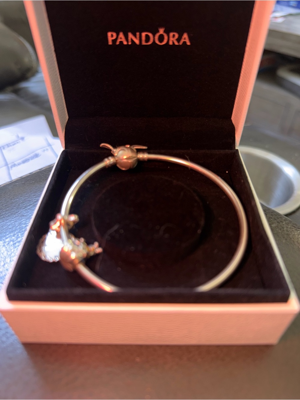 Pandora  Harry Potter silver bangle with multiple charms.